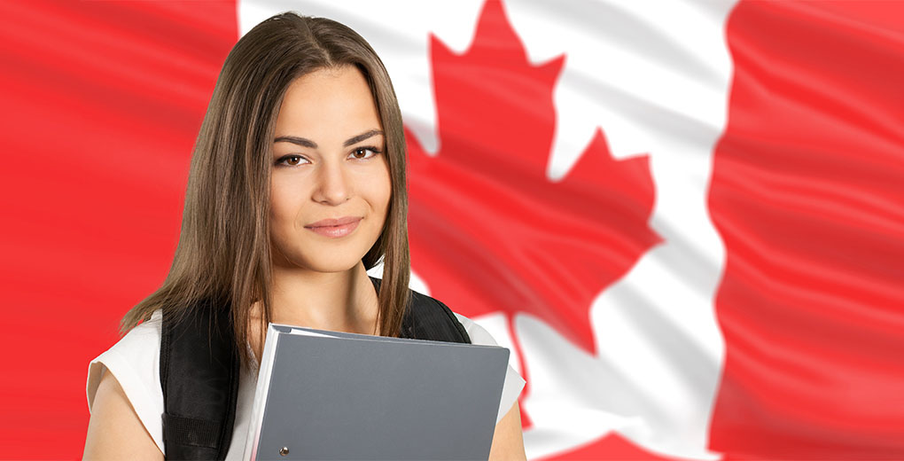 Girl Sitting in front of Canadian Flag